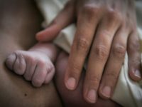 Nurse arrested after US woman gave birth in vegetative state