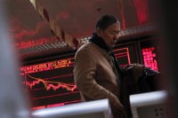 Asia shares mixed, Shanghai down after Apple sales warning