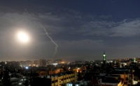 Syria This photo released by the Syrian official news agency SANA, shows missiles flying into the sky near international airport, in Damascus, Syria, Monday, Jan. 21, 2019. In a very unusual move, the Israeli military has issued a statement saying it is attacking Iranian military targets in Syria. It is also warning Syrian authorities not to retaliate against Israel. (SANA via AP) The Associated Press