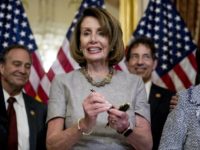 Government Shutdown Nancy Pelosi House Speaker Nancy Pelosi of Calif., accompanied by House Democratic members stand after signs a deal to reopen the government on Capitol Hill in Washington, Friday, Jan. 25, 2019. The measure now goes to the White House for President Donald Trump to sign. (AP Photo/Andrew Harnik) The Associated Press