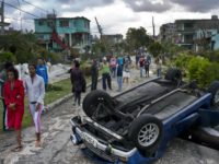 APTOPIX Cuba Tornado A car overturned by a tornado lays smashed on top of a street pole in Havana, Cuba, Monday, Jan. 28, 2019. A tornado and pounding rains smashed into the eastern part of Cuba's capital overnight, toppling trees, bending power poles and flinging shards of metal roofing through the air as the storm cut a path of destruction across eastern Habana. (AP Photo/Ramon Espinosa) The Associated Press