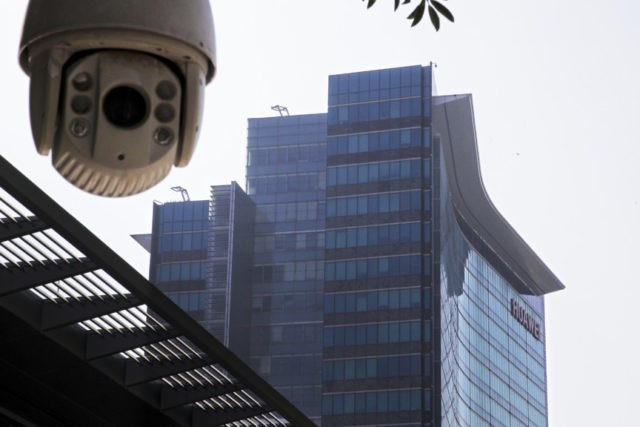 China US Huawei In this Dec. 18, 2018, photo, a surveillance camera is mounted near the Huawei headquarters in Shenzhen in south China's Guangdong province. The U.S. Justice Department unsealed criminal charges Monday, Jan. 28, 2019 against Chinese tech giant Huawei, a top company executive and several subsidiaries, alleging the company stole trade secrets, misled banks about its business and violated U.S. sanctions. (AP Photo/Andy Wong) The Associated Press
