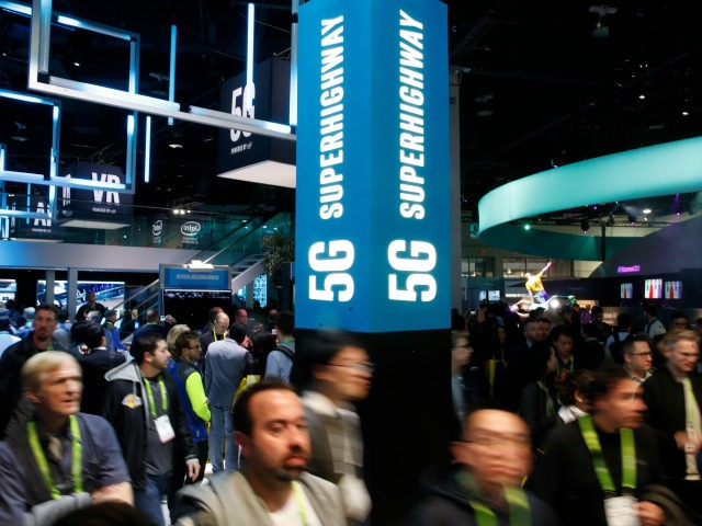 A sign advertises 5G devices at the Intel booth during CES International, Tuesday, Jan. 9,