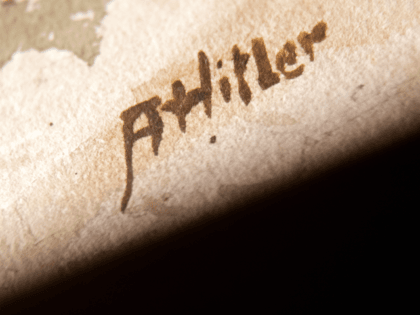 A picture taken on February 8, 2019 shows the signature 'AHitler' on a watercolour entitle