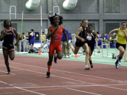 In this Thursday, Feb. 7, 2019 photo, Bloomfield High School transgender athlete Terry Miller, second from left, wins the final of the 55-meter dash over transgender athlete Andraya Yearwood, left, and other runners in the Connecticut girls Class S indoor track meet at Hillhouse High School in New Haven, Conn. …