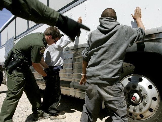 Border Patrol agents arrest illegal aliens in Arizona. (AP File Photo/Khampha Bouaphanh)