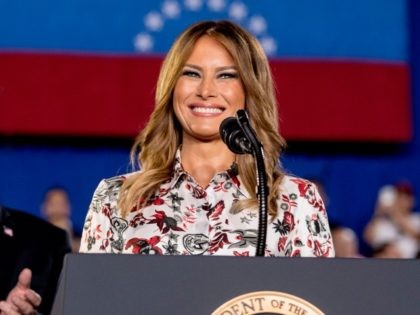 First lady Melania Trump, accompanied by President Donald Trump, smiles as she speaks in front of a Venezuelan American community at Florida Ocean Bank Convocation Center at Florida International University in Miami, Fla., Monday, Feb. 18, 2019, as Trump speaks out against President Nicolas Maduro's government and its socialist policies. …