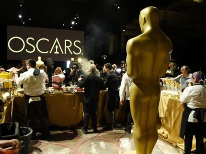 An Oscar statue stands behind a display of food to be served at this year's 91st Academy Awards Governors Ball, at the press preview for the event, Friday, Feb. 15, 2019, in Los Angeles. The 91st Academy Awards will be held on Sunday, Feb. 24. at the Dolby Theatre in …