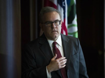 Acting EPA Administrator Andrew Wheeler announces that new coal plants no longer have to meet planned, tougher, Obama era emissions standards, during a news conference at the EPA Headquarters in Washington, Thursday, Dec. 6, 2018. (AP Photo/Cliff Owen)