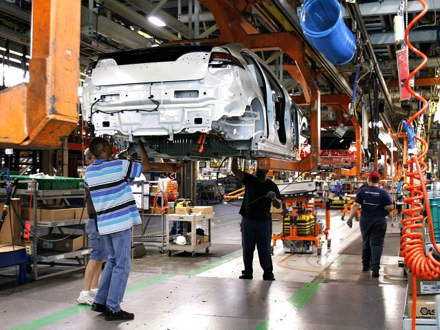 HAMTRAMCK, MI - OCTOBER 11: Assembly line workers assemble Chevy Volt electric vehicles an