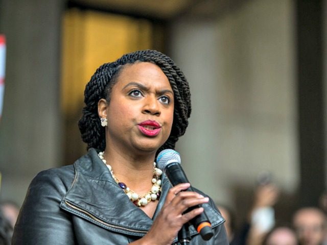 BOSTON, MA - OCTOBER 01: Boston City Councilor and Democratic congressional candidate Ayanna Pressley speaks at a rally calling on Sen. Jeff Flake (R-AZ) to reject Judge Brett Kavanaugh's nomination to the Supreme Court on October 1, 2018 in Boston, Massachusetts. Sen. Flake is scheduled to give a talk at …