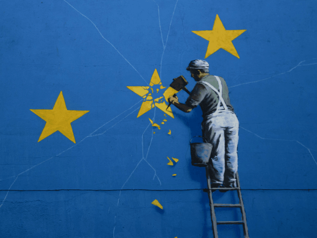 DOVER, ENGLAND - AUGUST 29: A painted mural by British graffiti artist Banksy, depicting a workman chipping away at one of the stars on a European Union (EU) themed flag on August 29, 2018 in Dover, England. (Photo by Dan Kitwood/Getty Images)