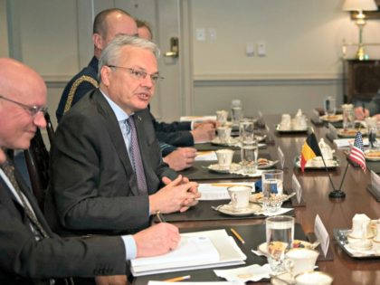 Belgian Defense Minister Didier Reynders, center, speaks during a meeting with Acting Secretary of Defense Patrick Shanahan on Thursday, Feb. 21, 2019 at the Pentagon in Washington. (AP Photo/Kevin Wolf)