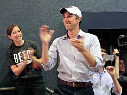 U.S. Rep. Beto O'Rourke, D-El Paso, the 2018 Democratic candidate for U.S. Senate in Texas, with his wife Amy, left, arrives for a campaign rally, Monday, Nov. 5, 2018, in El Paso, Texas. (AP Photo/Eric Gay)