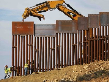 Border fence construction (Mario Tama / Getty)