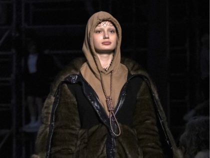 This Feb. 17, 2019 photo shows a model wearing a creation by Burberry at the Autumn/Winter 2019 fashion week runway show in London. The chief executive and chief creative officer of luxury powerhouse Burberry have apologized for putting a hoodie with strings tied in the shape of a noose on …