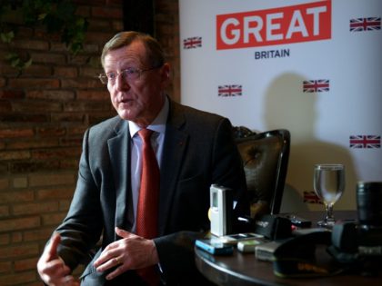 Northern Irish Nobel Peace Prize laureate Lord David Trimble gestures as he discusses efforts to negotiate a peace accord between the Philippine government and the Moro Islamic Liberation Front (MILF) in the south during a press briefing in Manila on November 16 2012. Trimble will travel to the troubled southern …