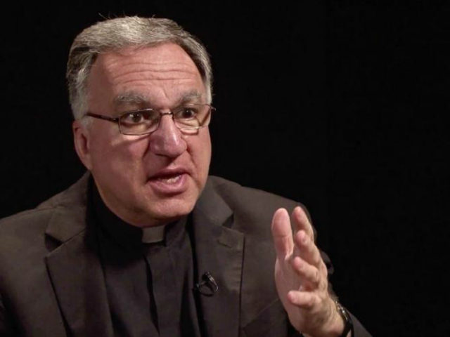 Father Thomas Rosica with hand gesture