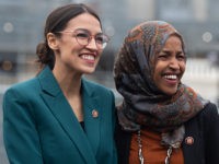 US Representative Alexandria Ocasio-Cortez, Democrat of New York, and US Representative Ilhan Omar (R), Democrat of Minnesota, attend a press conference calling on Congress to cut funding for US Immigration and Customs Enforcement (ICE) and to defund border detention facilities, outside the US Capitol in Washington, DC, February 7, 2019. …
