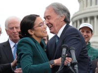Democratic Lawmakers Rep. Alexandria Ocasio-Cortez And Sen. Ed Markey Unveil Their Green New Deal Resolution WASHINGTON, DC - FEBRUARY 07: U.S. Rep. Alexandria Ocasio-Cortez (D-NY) (L) and Sen. Ed Markey (D-MA) (R) hug each other as other Congressional Democrats look on during a news conference in front of the U.S. Capitol February 7, 2019 in Washington, DC. Sen. Markey and Rep. Ocasio-Cortez held a news …
