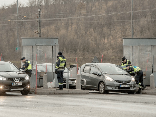 MALMO, SWEDEN - FEBRUARY 06: Swedish police officers check driver's IDs at the Oresund bridge on February 5, 2016 in Malmo, Sweden. ID checks on the border with Denmark has been set up by the Swedish government since January 4. Last year Sweden received 162,877 asylum applications, more than any …