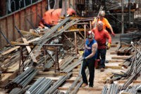 NEW YORK, NY - AUGUST 16: Construction laborers work on the site of a new residential building in the Hudson Yards development, August 16, 2016 in New York City. Home construction in the U.S. accelerated in July to the fastest pace in five months. While housing starts were up 2.1 …