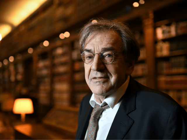 Member of the Academie Francaise (French Academy), French philosopher Alain Finkielkraut is pictured in the Academy's library on December 1, 2016 prior to the institution's annual public session in Paris. / AFP / Eric FEFERBERG (Photo credit should read ERIC FEFERBERG/AFP/Getty Images)