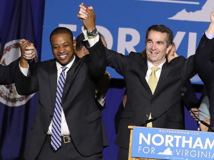 FAIRFAX, VA - NOVEMBER 07: Gov.-elect Ralph Northam (C) links arms with (L-R) current Gov. Terry McAuliffe, Lt. Gov.-elect Justin Fairfax, Attorney General-elect Mark Herring, and U.S. Sen. Mark Warner (D-VA) at an election night rally November 7, 2017 in Fairfax, Virginia. Northam defeated Republican candidate Ed Gillespie. (Photo by …