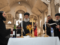 Syriac Orthodox Patriarch of Antioch, Ignatius Aphrem II, holds mass at the heavily damaged Syriac Orthodox church of St. Mary in Syria's eastern city of Deir Ezzor on February 3, 2018. / AFP PHOTO / Ayham al-Mohammad (Photo credit should read AYHAM AL-MOHAMMAD/AFP/Getty Images)