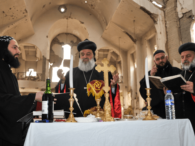 Syriac Orthodox Patriarch of Antioch, Ignatius Aphrem II, holds mass at the heavily damage