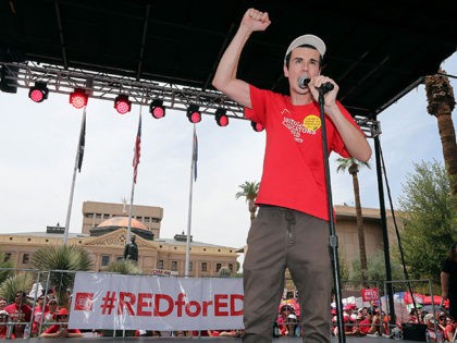 PHOENIX, AZ - APRIL 26: Noah Karvelis, an organizer of the #REDforED movement, speaks during a rally in front of the State Capitol on April 26, 2018 in Phoenix, Arizona. Teachers state-wide staged a walkout strike on Thursday in support of better wages and state funding for public schools. (Photo …