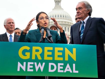 Rep. Alexandria Ocasio-Cortez and Sen. Ed Markey (right) speak during a press conference t