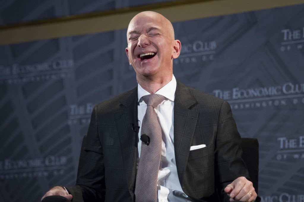 Jeff Bezos, Amazon founder and CEO, laughs as he speaks at a Washington, DC, event in September 2018. (Cliff Owen/AP Photo)