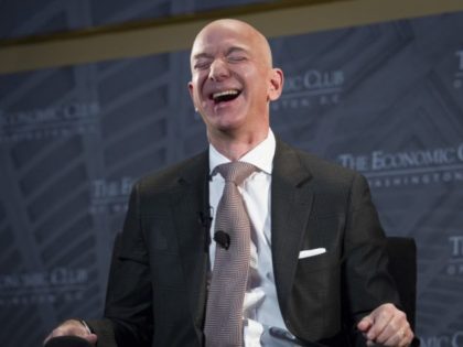 Jeff Bezos, Amazon founder and CEO, laughs as he speaks at a Washington, DC, event in September 2018. (Cliff Owen/AP Photo)