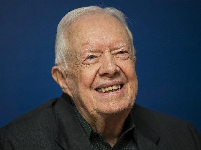 NEW YORK, NY - MARCH 26: Former U.S. President Jimmy Carter smiles during a book signing e