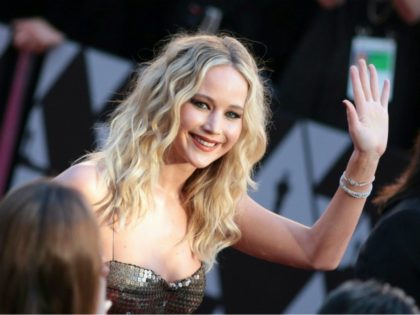 TOPSHOT - Actress Jennifer Lawrence arrives for the 90th Annual Academy Awards on March 4, 2018, in Hollywood, California. (Photo by Kyle GRILLOT / AFP) (Photo credit should read KYLE GRILLOT/AFP/Getty Images)