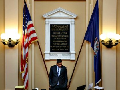 RICHMOND, VA - FEBRUARY 08: Virginia Lt. Governor Justin Fairfax (C) presides over a session on the Senate floor at the Virginia State Capitol, February 8, 2019 in Richmond, Virginia. Virginia state politics are in a state of upheaval, with Governor Ralph Northam and State Attorney General Mark Herring both …