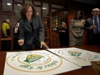 Kamala Harris New Hampshire Democratic presidential candidate Sen. Kamala Harris, D-Calif., signs posters at a Politics & Eggs campaign event, Tuesday, Feb. 19, 2019, in Manchester, N.H. (AP Photo/Elise Amendola)