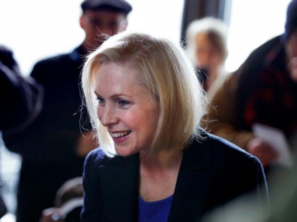 Sen. Kirsten Gillibrand, D-NY, smiles as she listens to a patron while visiting a coffee shop on Main Street in Concord, N.H., Friday, Feb. 15, 2019. Gillibrand visited New Hampshire as she explores a 2020 run for president. (AP Photo/Charles Krupa)