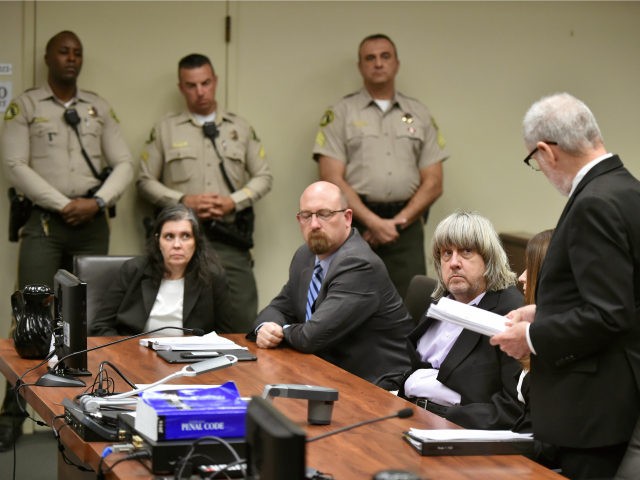 In this Jan. 18, 2018 file photo, Louise Anna Turpin, far left, with attorney Jeff Moore,