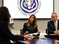 First Lady Melania Trump participates in a policy briefing at the Office of National Drug Control Policy, Thursday, Feb. 7, 2019, in Washington, next to director Jim Carroll. (AP Photo/Jacquelyn Martin)