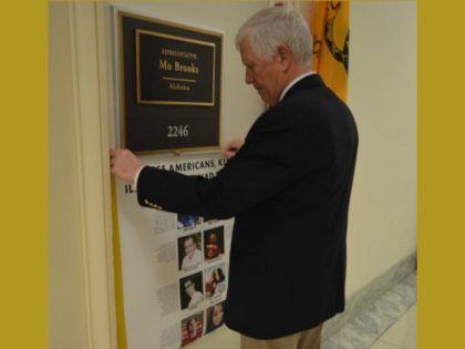 Congressman Mo Brooks hangs a poster of Americans with dreams, but killed by illegal aliens opposite Rep. Castro illegal alien “dreamers” poster (Credit: Office of Congressman Mo Brooks)