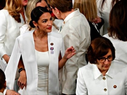 Democratic members of Congress, including Rep. Alexandria Ocasio-Cortez, D-N.Y., center, a