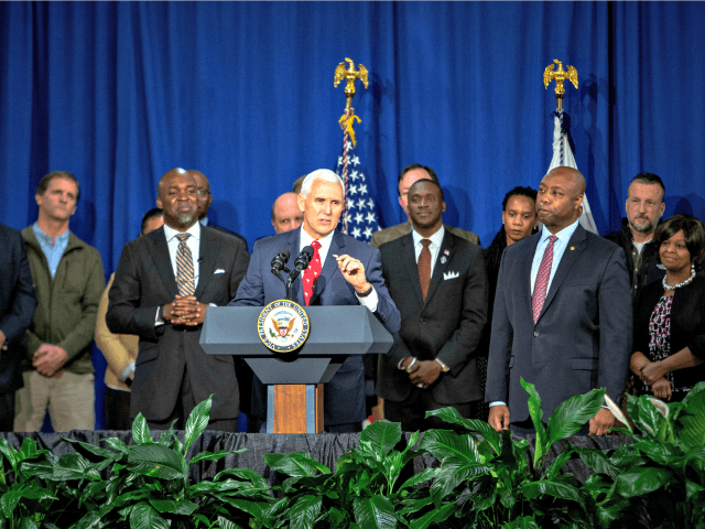 Vice President Mike Pence, center, delivers a speech during a visit to The Meeting Place C