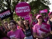 Planned-Parenthood-rally Protesters rally against the GOP health care plan, on Capitol Hill, July 26, 2017 in Washington, DC.
