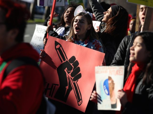 Parasitic Oakland Teachers Begin Strike for 12% Raise  RedforEd-Oakland-teachers-strike-Getty-640x480