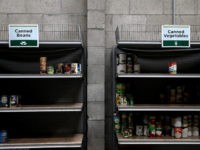 Reduction in Food Stamps Shelves of canned foods sit partially empty at the SF-Marin Food Bank on May 1, 2014 in San Francisco, California.