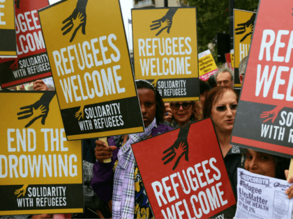 Demonstrators gather for a march calling for the British parliament to welcome refugees in the UK in central London on September 17, 2016. Thousands marched in central London calling on the British government to do more to help refugees fleeing conflict and persecution. / AFP PHOTO / Daniel LEAL-OLIVAS (Photo …