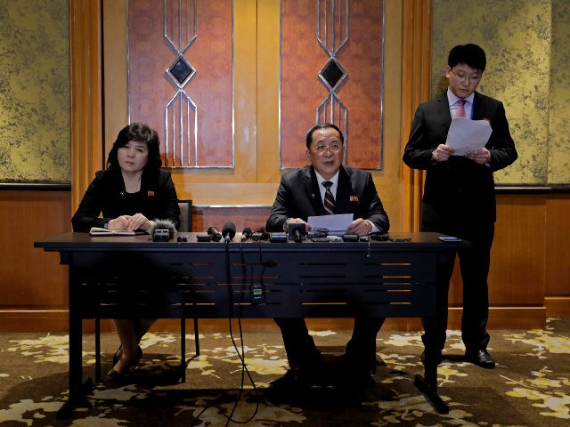 North Korea Foreign Minister Ri Yong Ho, center, talks during a press conference at Melia