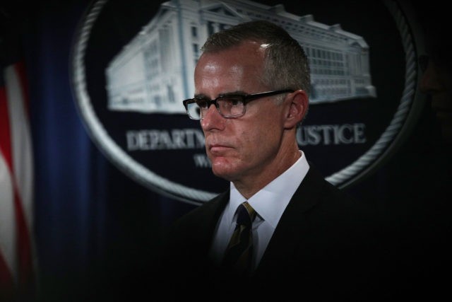 WASHINGTON, DC - JULY 13: Acting FBI Director Andrew McCabe listens during a news conferen